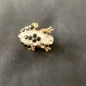 Gold tone frog brooch